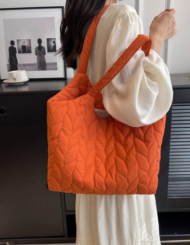 Sac matelassé en orange vibrant